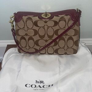 COACH Pink Jacquard Signature C Top Turn Lock Wristlet Mini Purse.